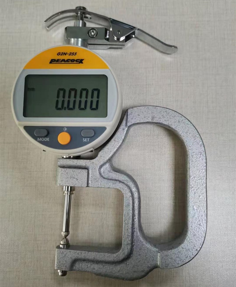 孔雀測厚規(guī).jpg 孔雀測厚規(guī).jpg