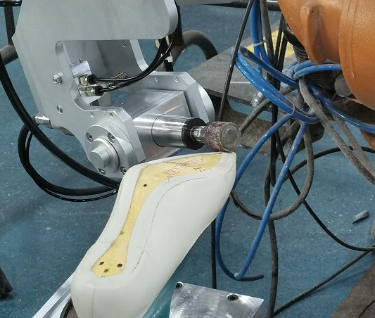 機(jī)器人鞋底打磨.png 機(jī)器人鞋底打磨.png